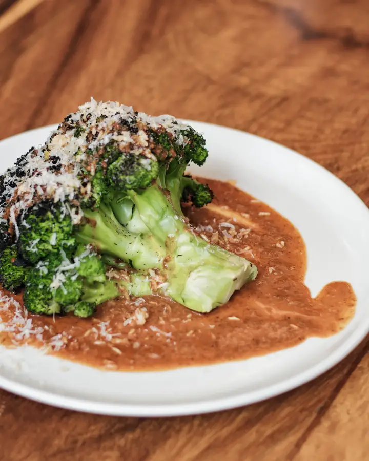 Roasted broccoli with nduja and grated cheese